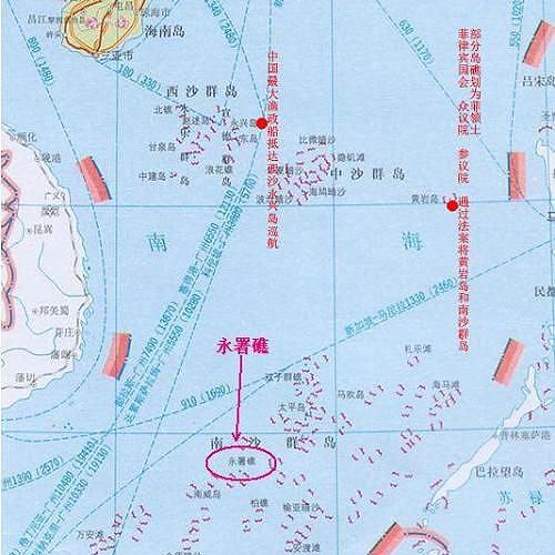 南沙守礁27年中国海军首登永暑礁持枪插上国旗瞬间