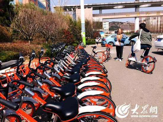 橙色共享单车亮相日照 更好的满足市民出行需求