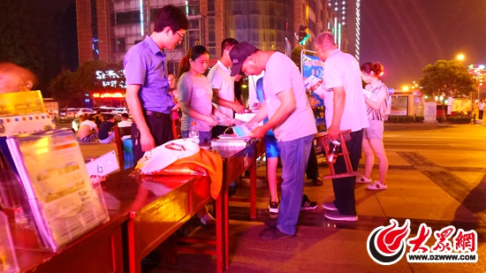 东港区文明旅游进社区活动在阳光社区举行